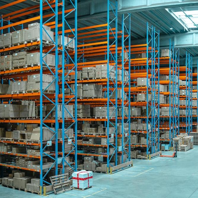 brown wooden shelf with books